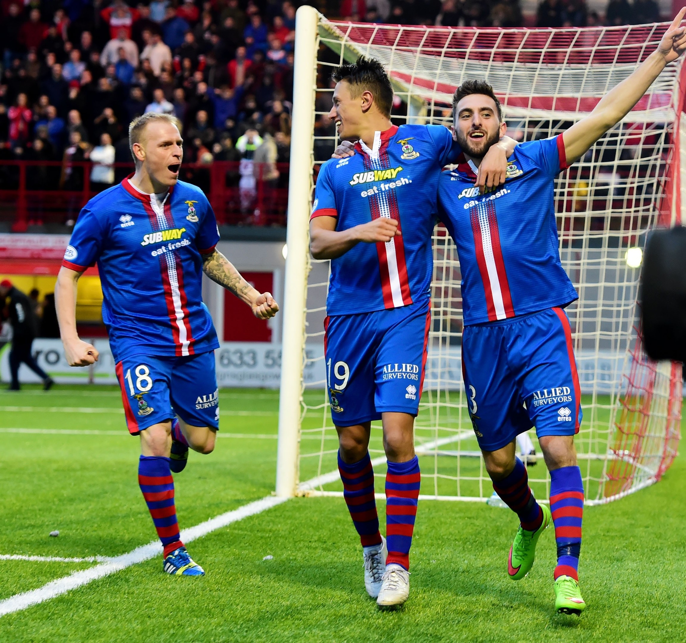 ICT's Graeme Shinne (right) celebrates with Carl Tremarco (left) and Danny Williams as his side go ahead due to an own goal from Hamilton's Grant Gillespie (not pictured).