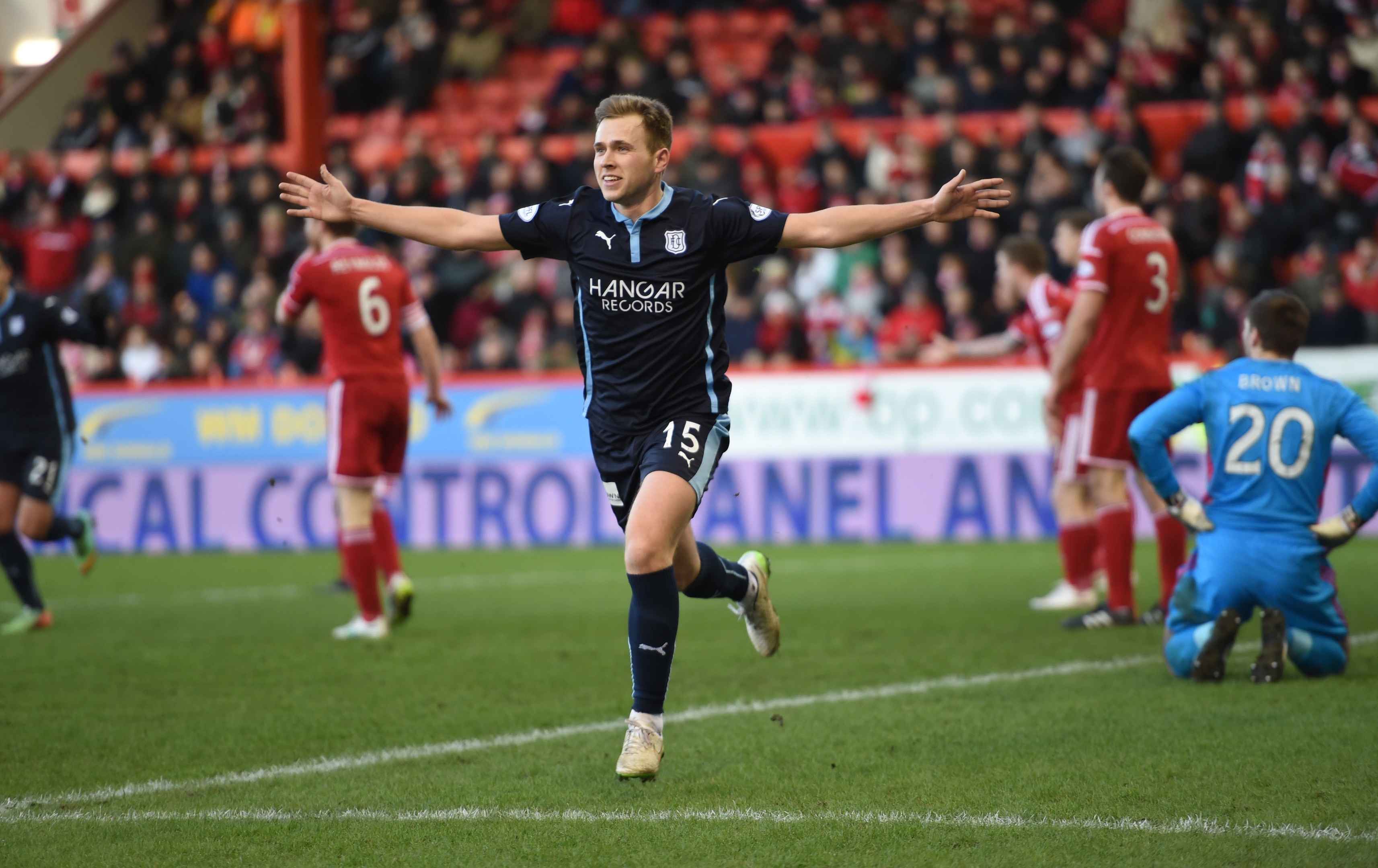 Greg Stewart celebrates netting for Dundee