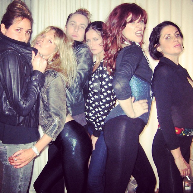 Kate Moss (second from left) with several other celebs, including Sadie Frost (far right) and James Brown (middle left)