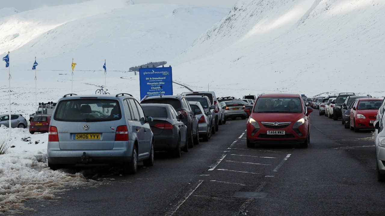 Police had to be called as thousands flocked to the Glencoe slopes after heavy snowfall
