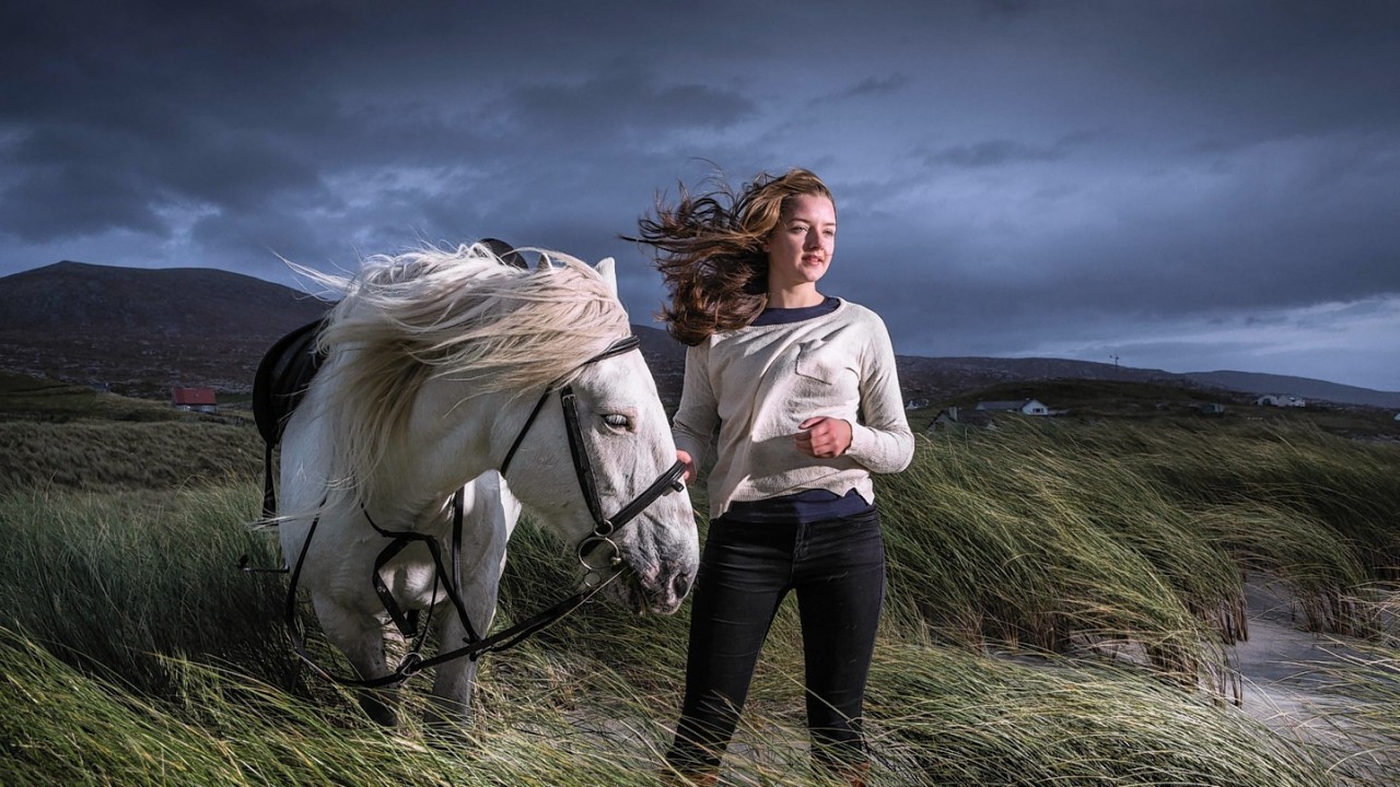 Joanna Mackay, sixth year student, rides an Eriskay pony on the dunes at Luskentyre Beach