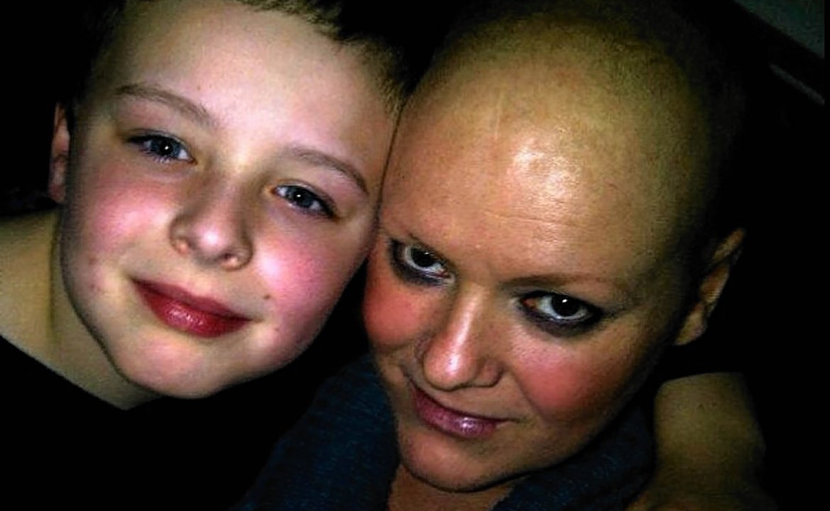 Brave cancer survivor Leeanne Curry with her two children