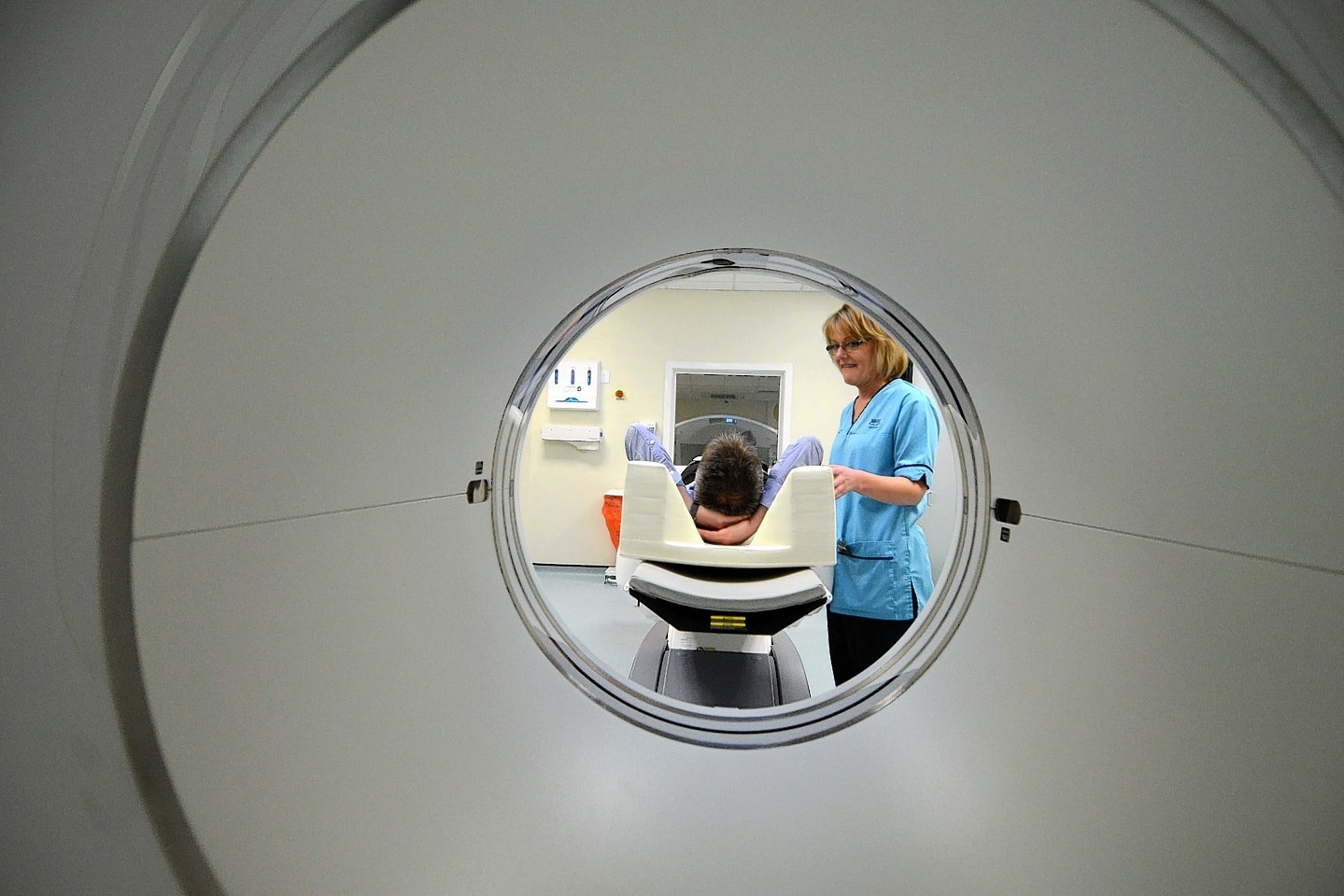 Magnetic resonance imaging (MRI) is a type of scan that uses strong magnetic fields and radio waves to produce detailed images of the inside of the body.