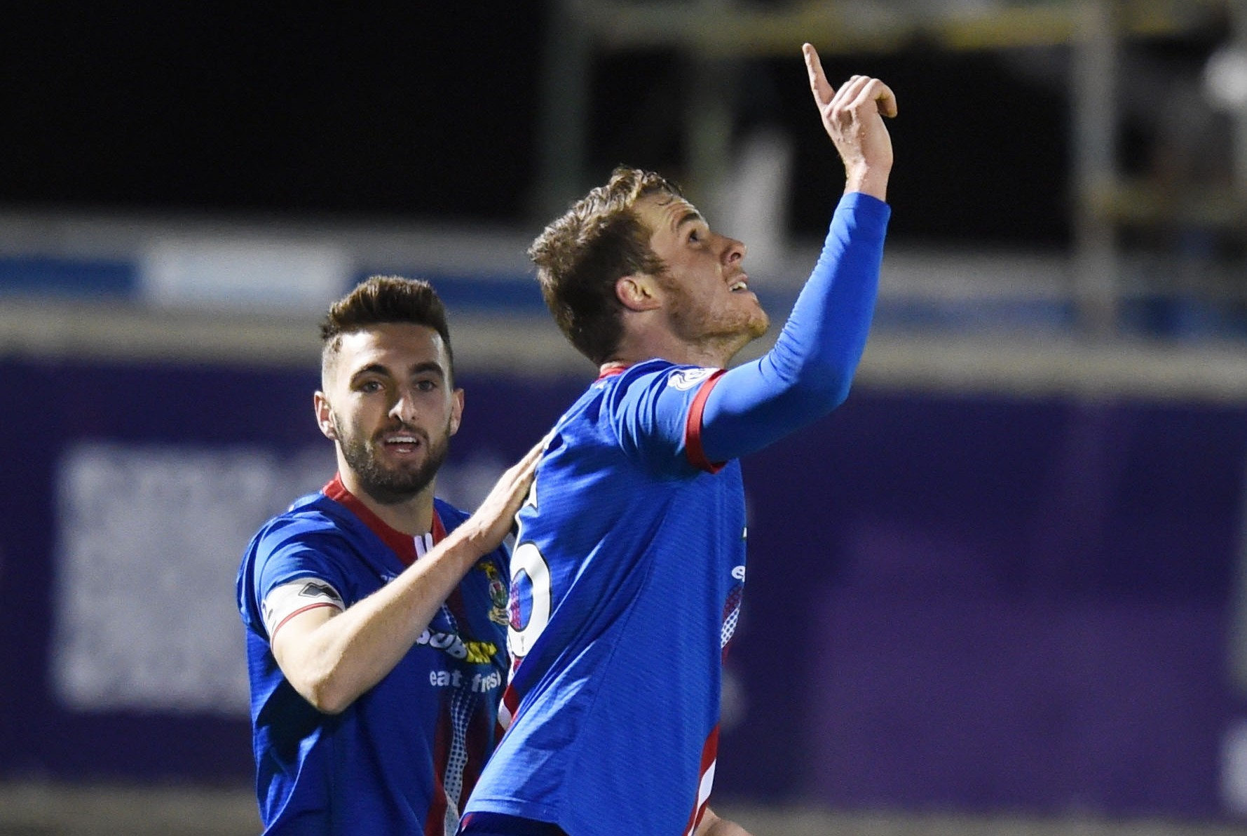 Marley Watkins celebrates Caley Thistle's second of the evening, set up by Tremarco