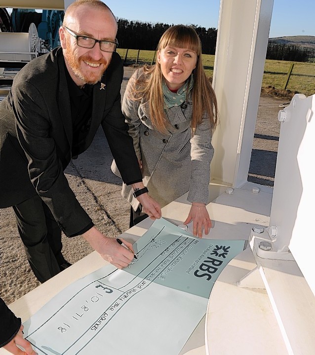 Motive Offshore Services Ltd at Boyndie, Banff handed over money to two charities - ARCHIE  and Cancer Research UK