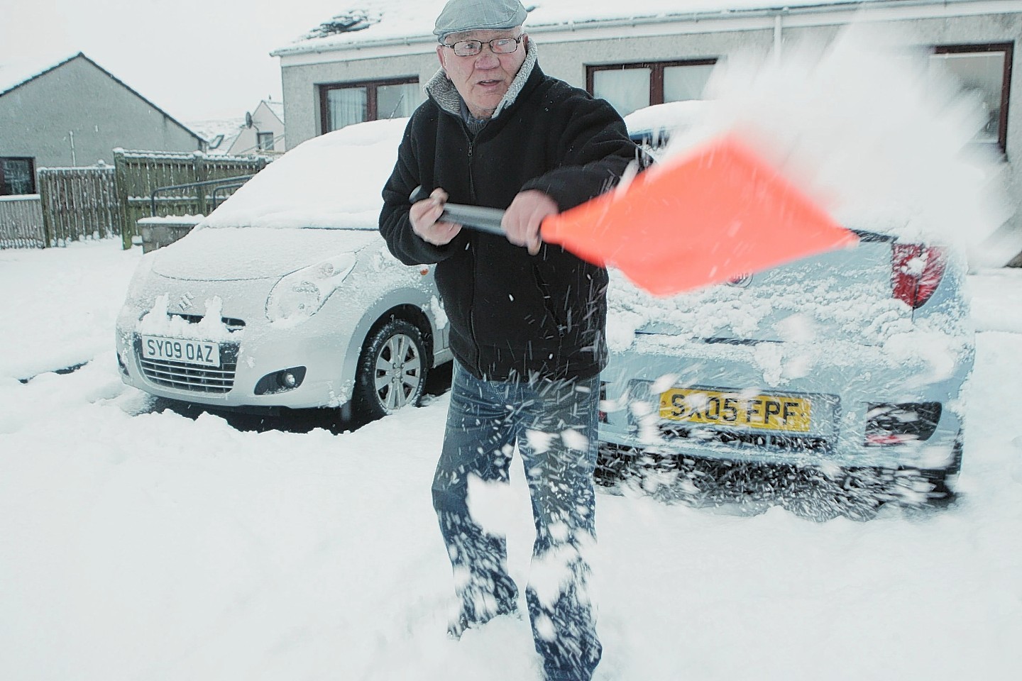Residents have taken to the streets to try to clear the snow in Muir of Ord