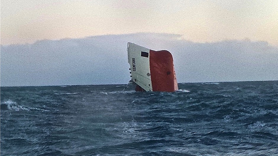 The upturned Cypriot registered Cemfjord vessel is no longer visible above water.