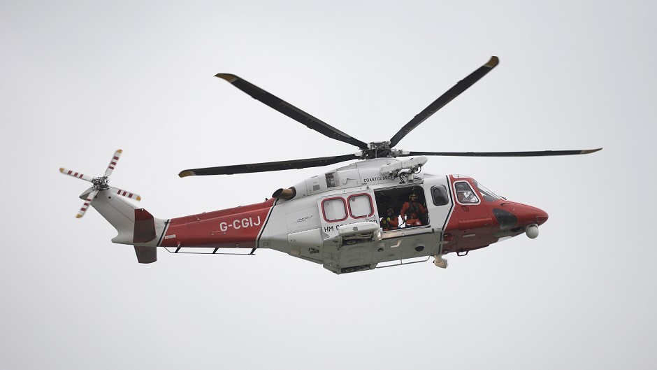 A Coastguard helicopter helped recover the fishermen