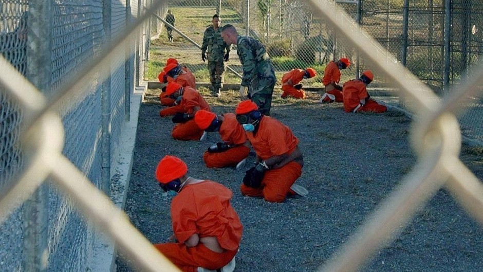 Detainees in a holding area at Guantanamo (US Department of Defence/PA)