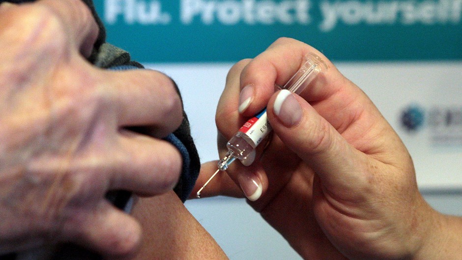 Ministers urged everyone with underlying health conditions to have the flu vaccine