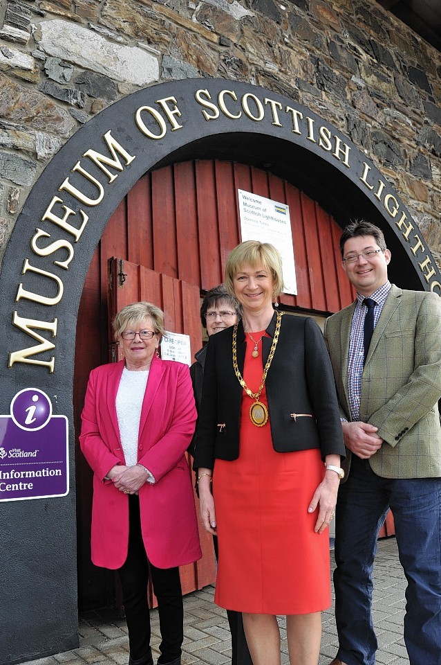 Philip Smith at the VisitScotland Information Centre in Fraserburgh  with Jill Chandler, museum trsutee and Elma Gibb, information advisor