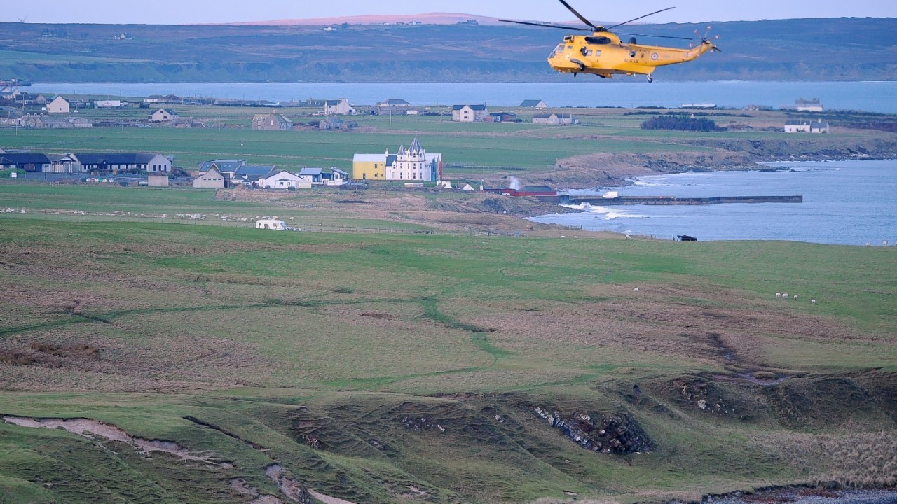 An RAF helicopter searches near John O'Groats