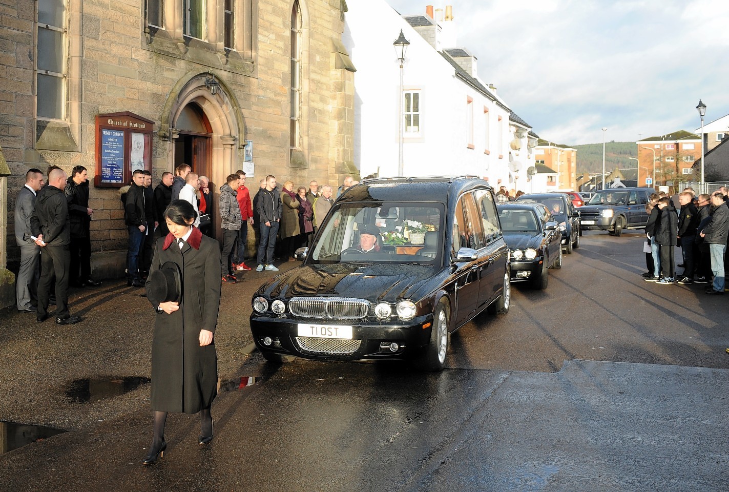 The hearse carrying Ryan Watt prepares to leave Trinity Church
