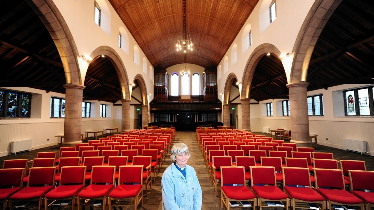 Midstocket Church minister Sarah Nicol with all her new chairs