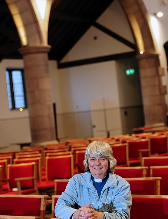Midstocket Church minister Sarah Nicol with all her new chairs