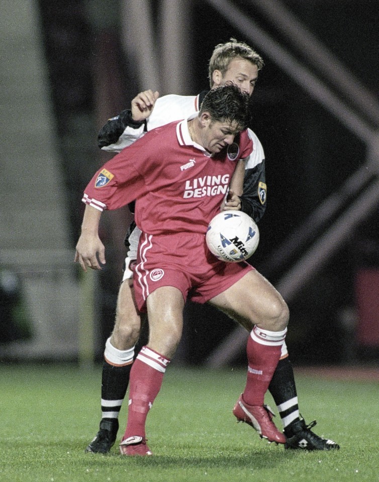 Aberdeen's Dean Windass challenged by Lars Zetterlund in the 1997 tie