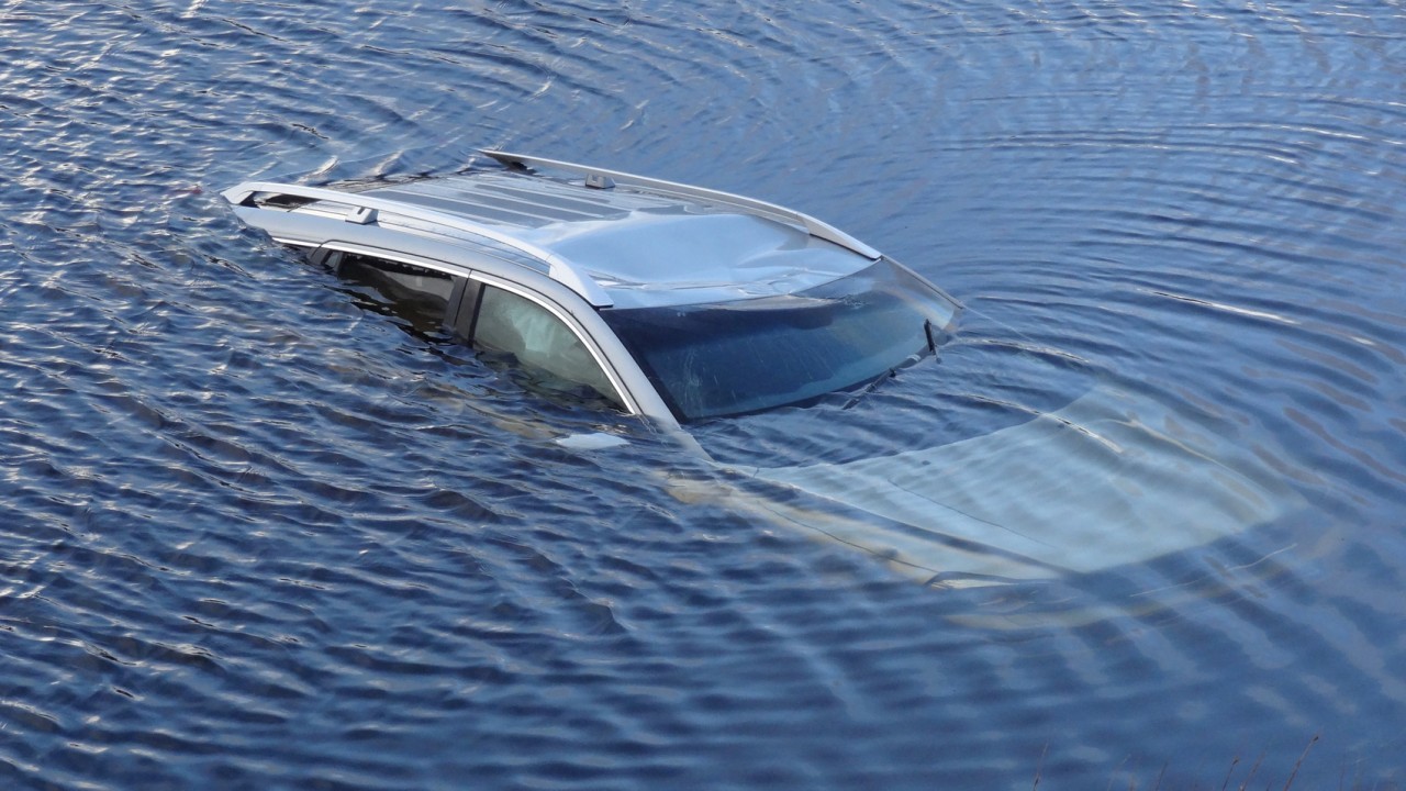 Fortunately the driver was able to smash the windscreen and escape from the car