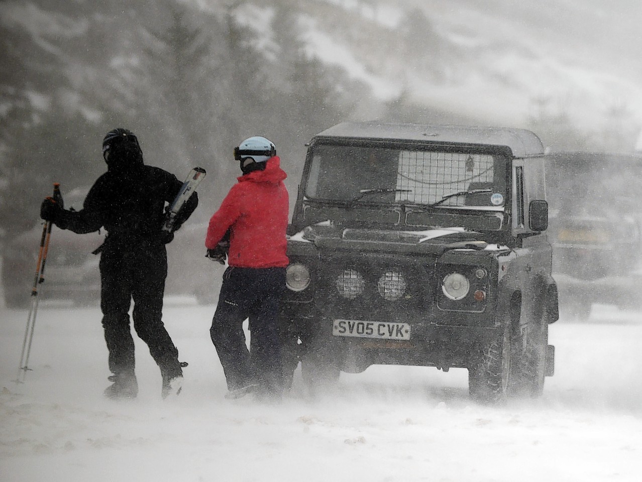 Skiers get ready in snow blizzards at Lecht, Aberdeenshire 