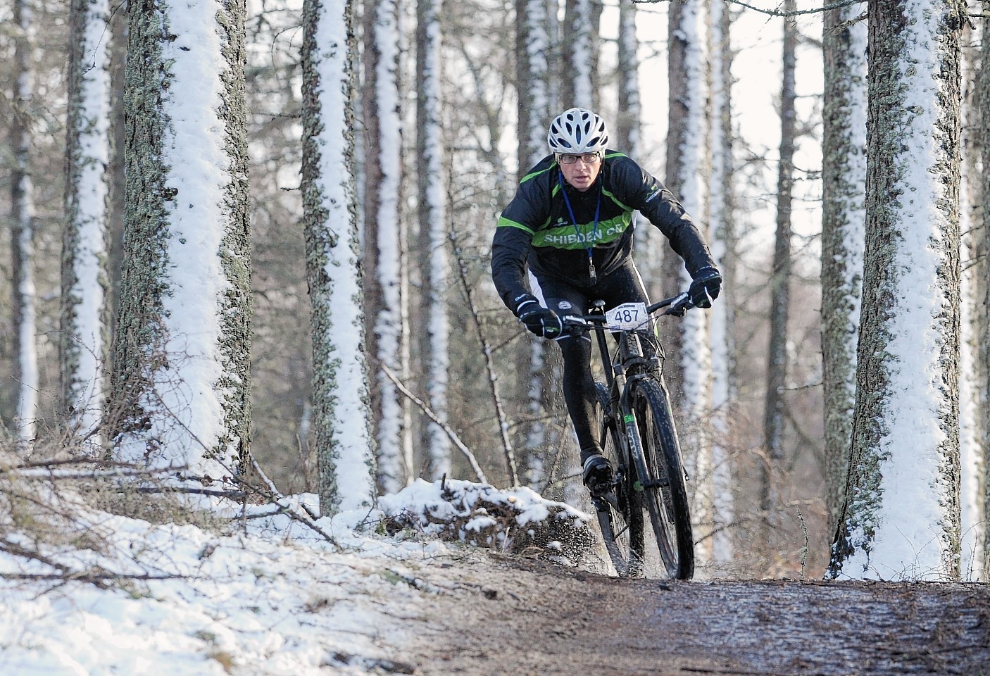 A competitor makes his way around the Strathpuffer course
