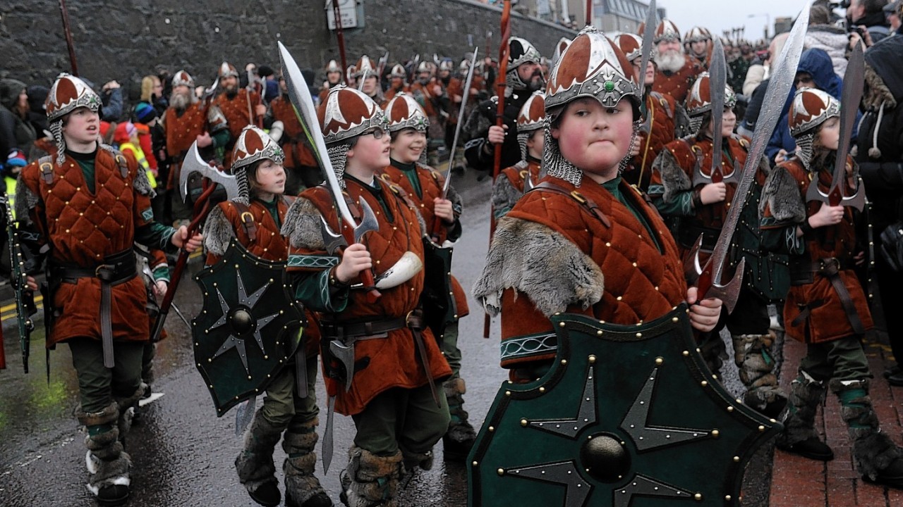 The Jarl Squad, led by Guizer Jarl, Neil Robertson, have marched through Lerwick. (Pictures by Kenny Elrick)