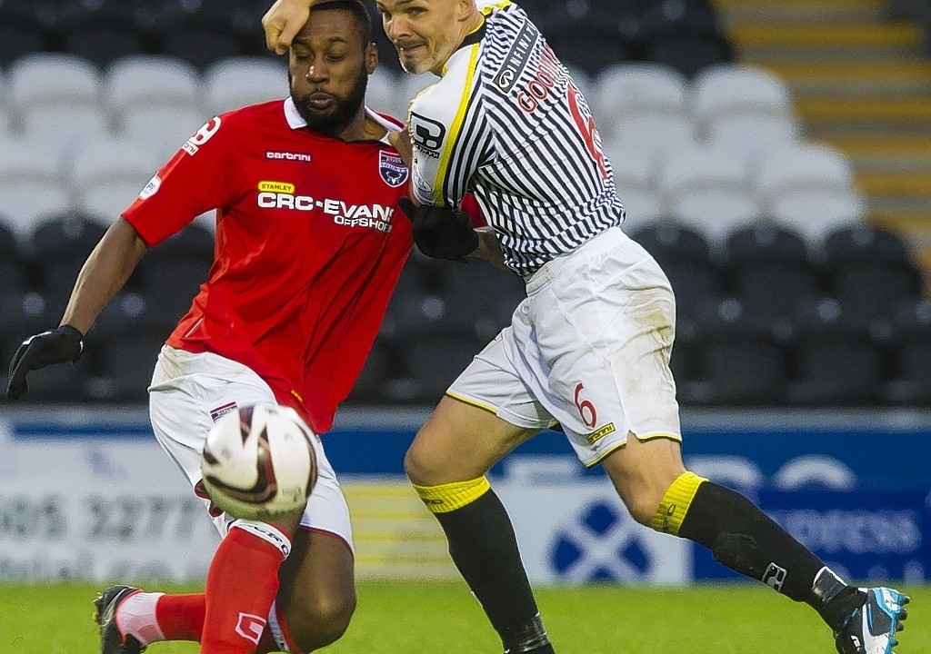Arquin playing for County against his new club, St Mirren