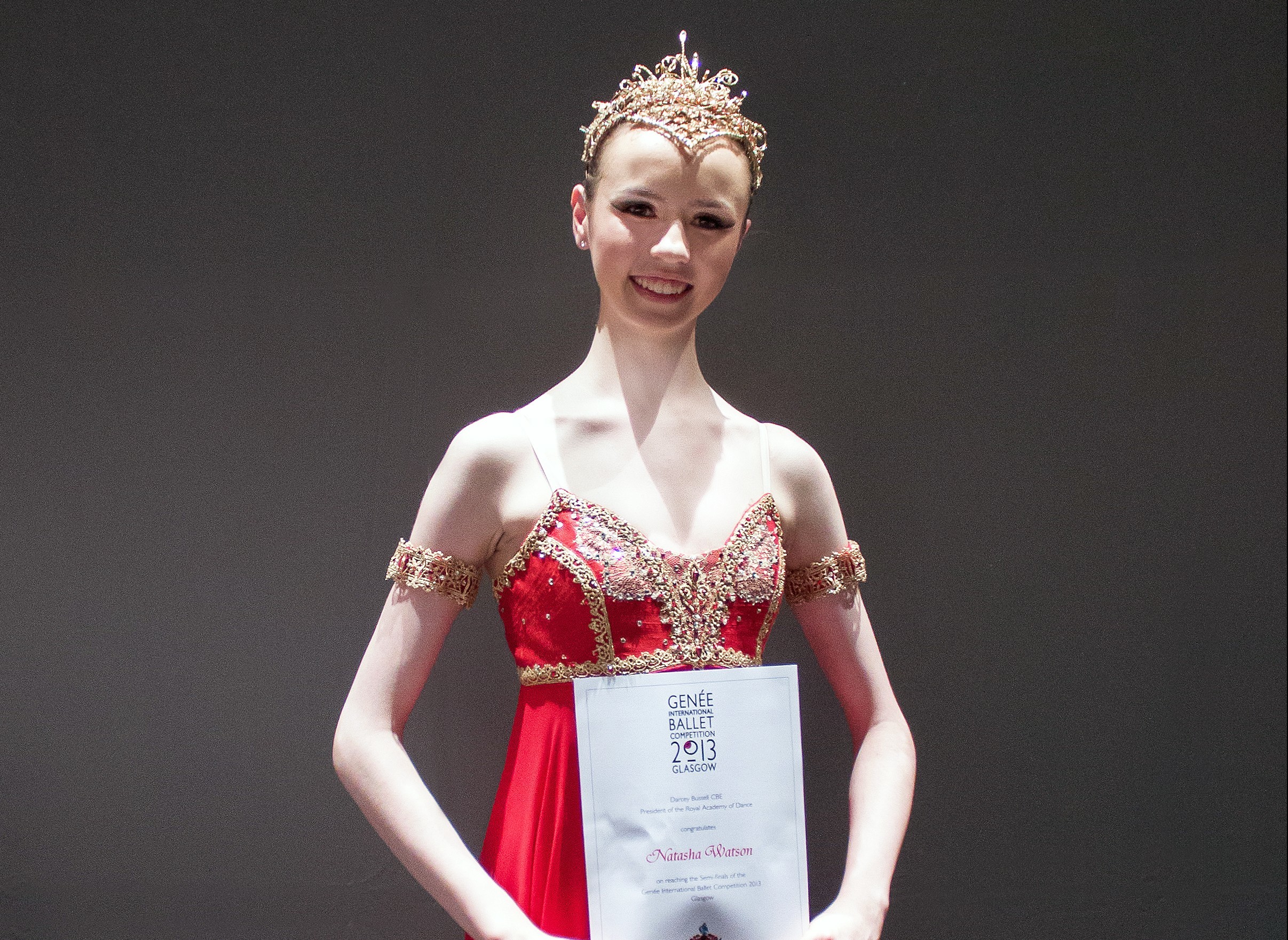 Natasha Watson with her certificate