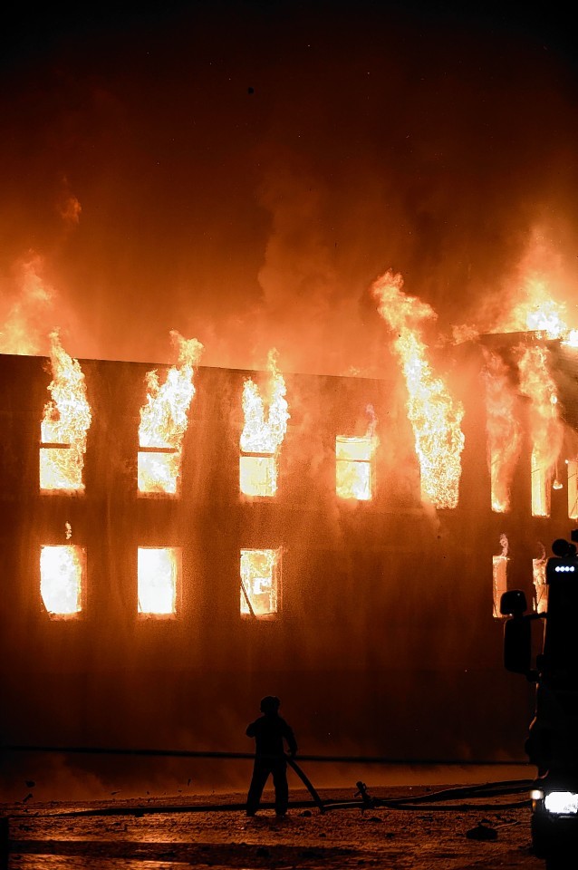 The fire tore through two buildings