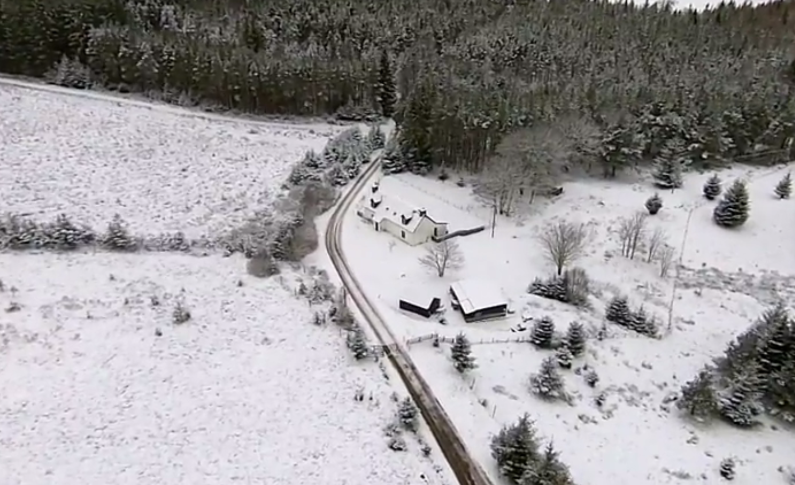 A drone video has captured snowy scenes in the Highlands