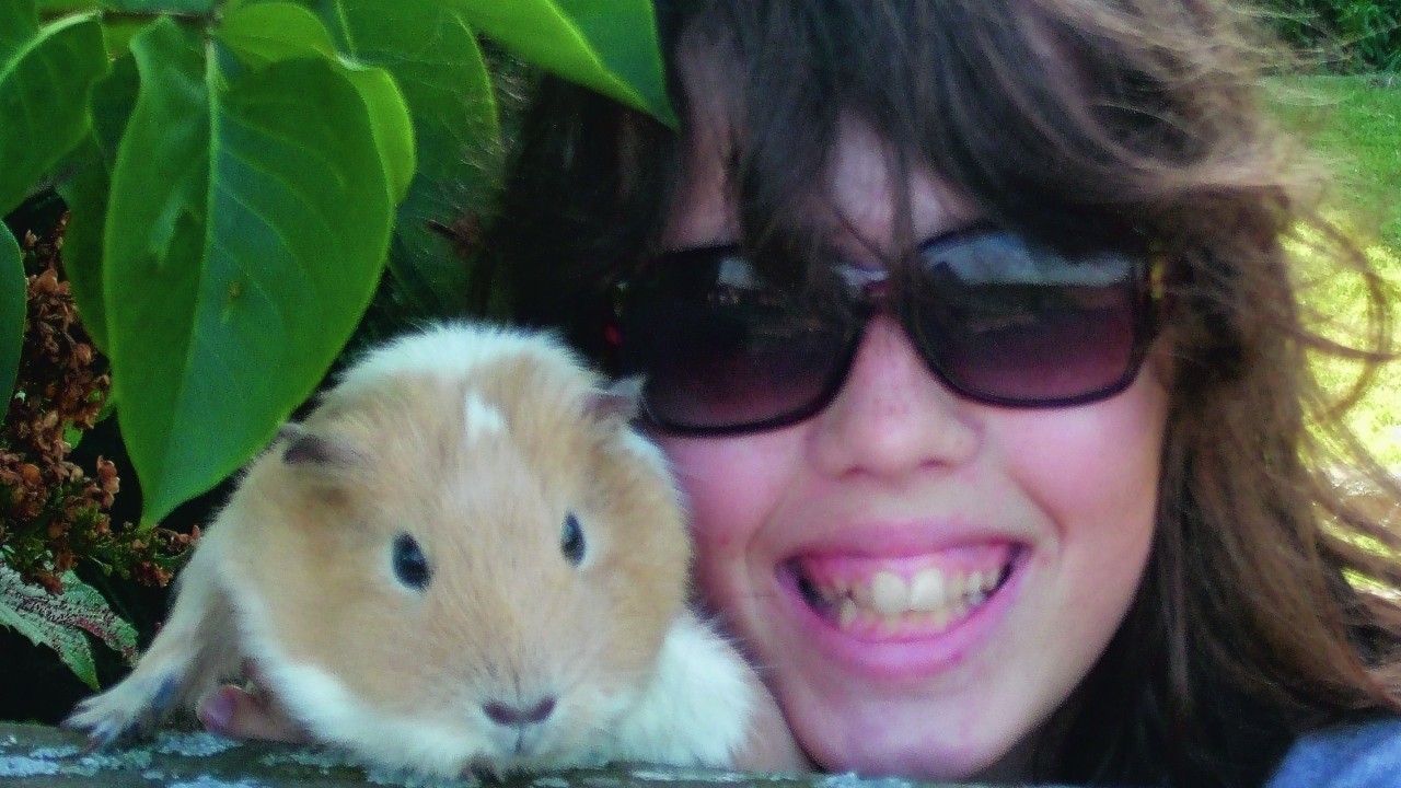 Sophie Macfarlane and pet guinea pig Caramel. They live in Inverness.