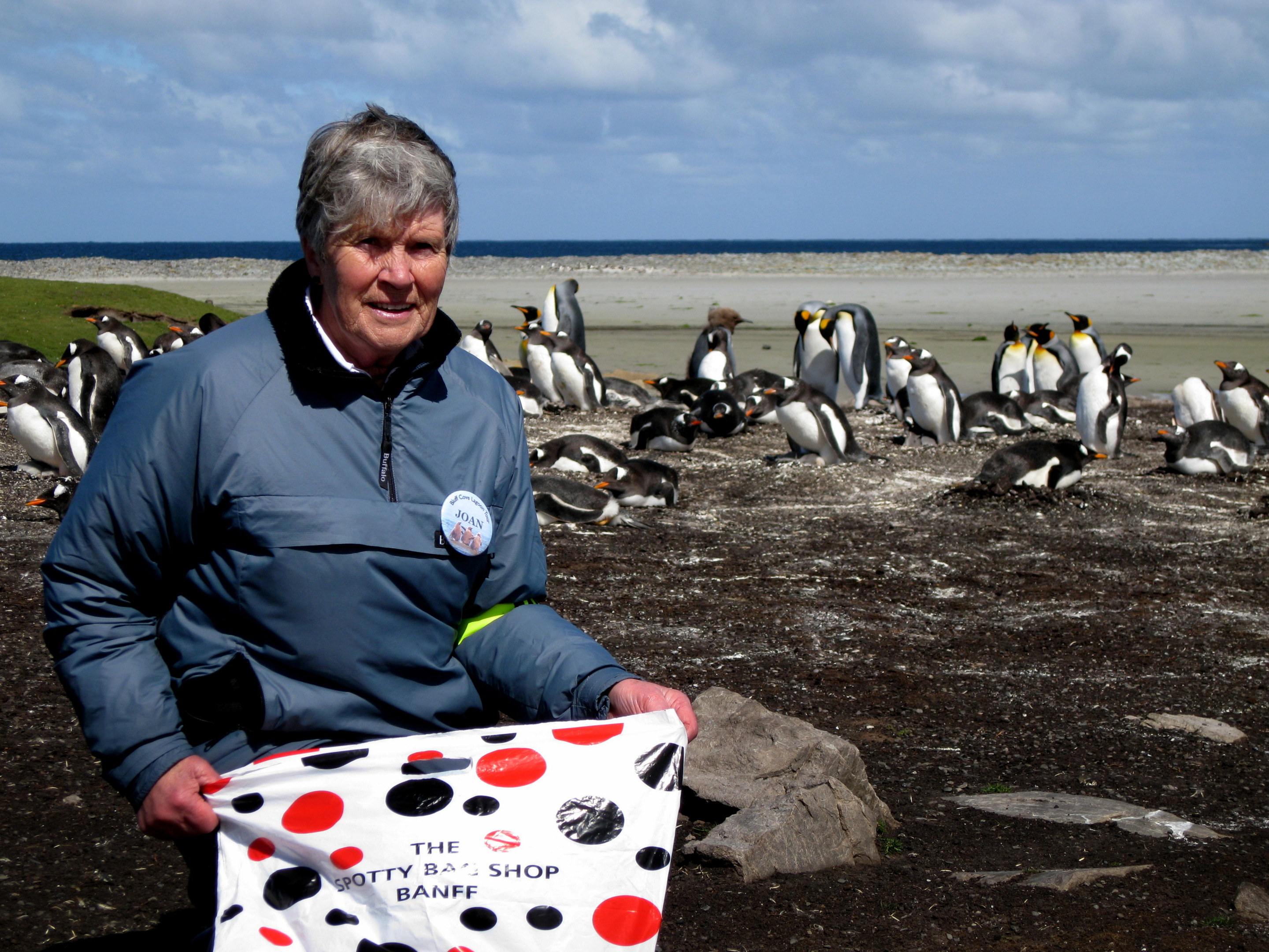 Joan Spruce on the Falkand Islands with a spotty bag