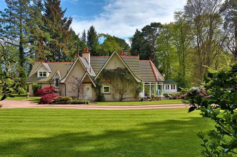 The picturesque five bedroom Baylissburn House on Dalmuinzie Road includes 3.3 acres of woodland.