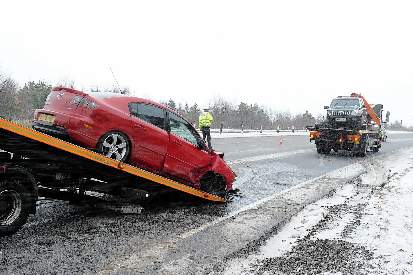 The scene of the crash on the A96 Aberdeen to Inverurie road, near Huntly, yesterday