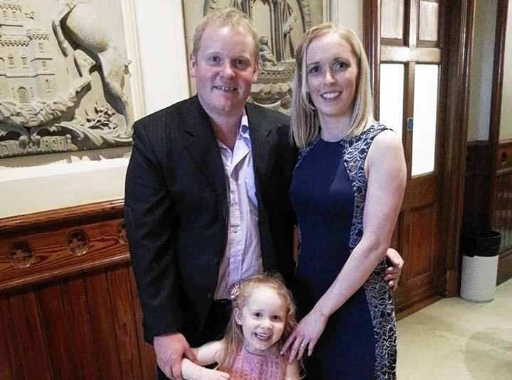 A happy family, Darron and Anna Smith with their daughter Ava
