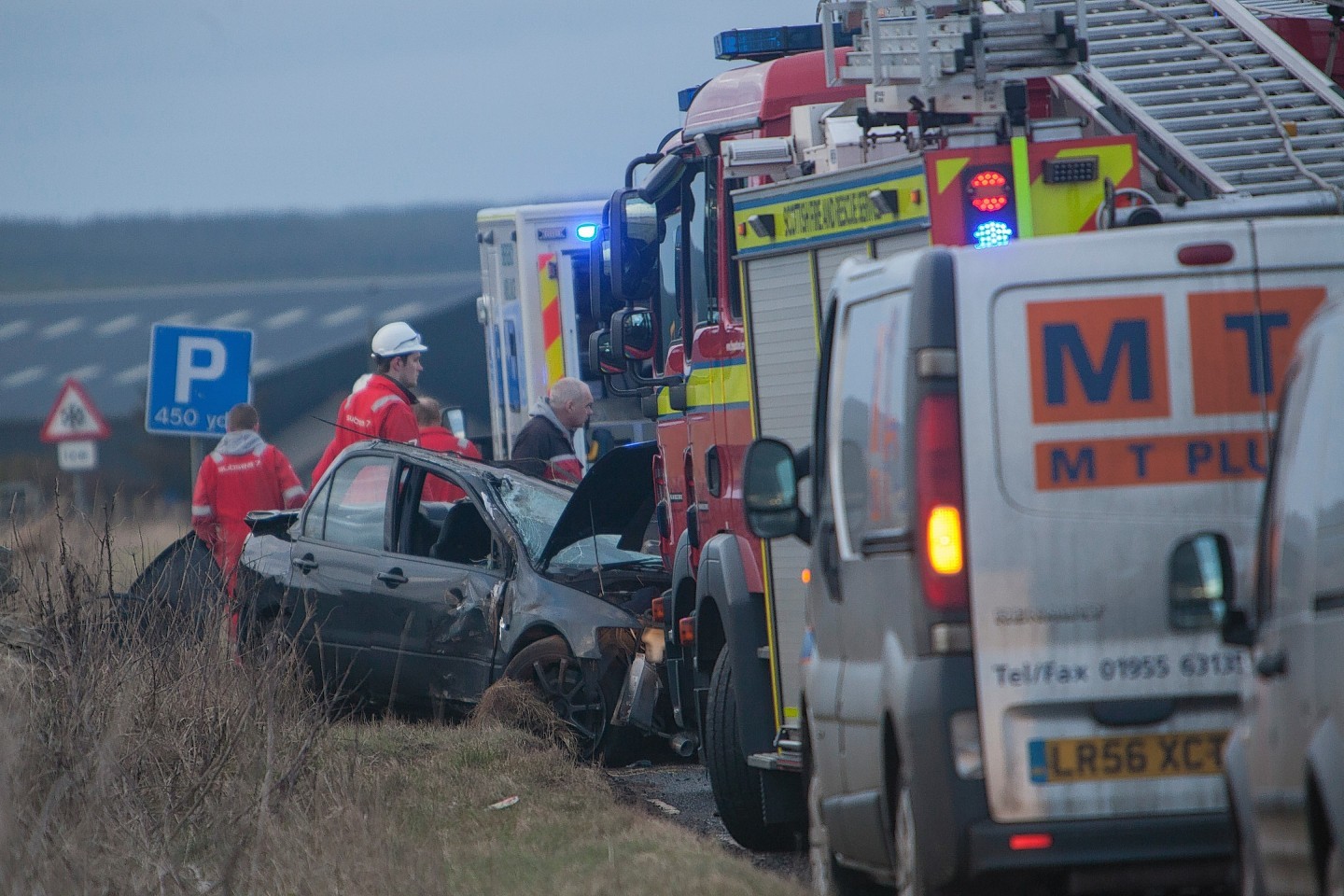 Emergency services at the scene of the accident on the A99