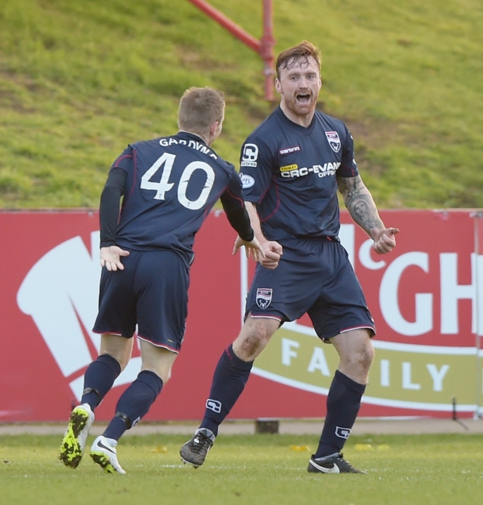 Craig Curran celebrates hitting the back of the net