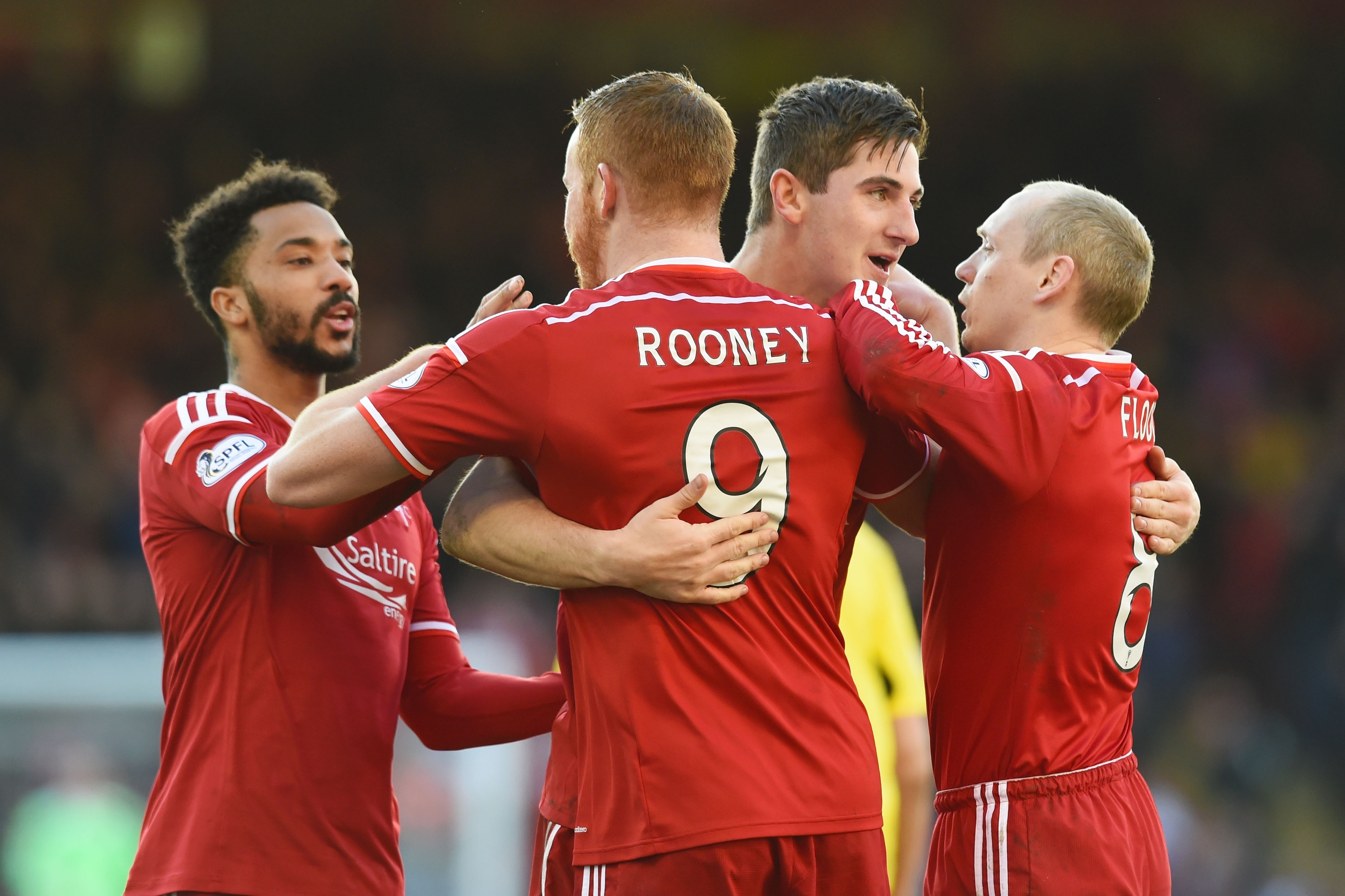 Aberdeen celebrate Rooney's second goal of the afternoon