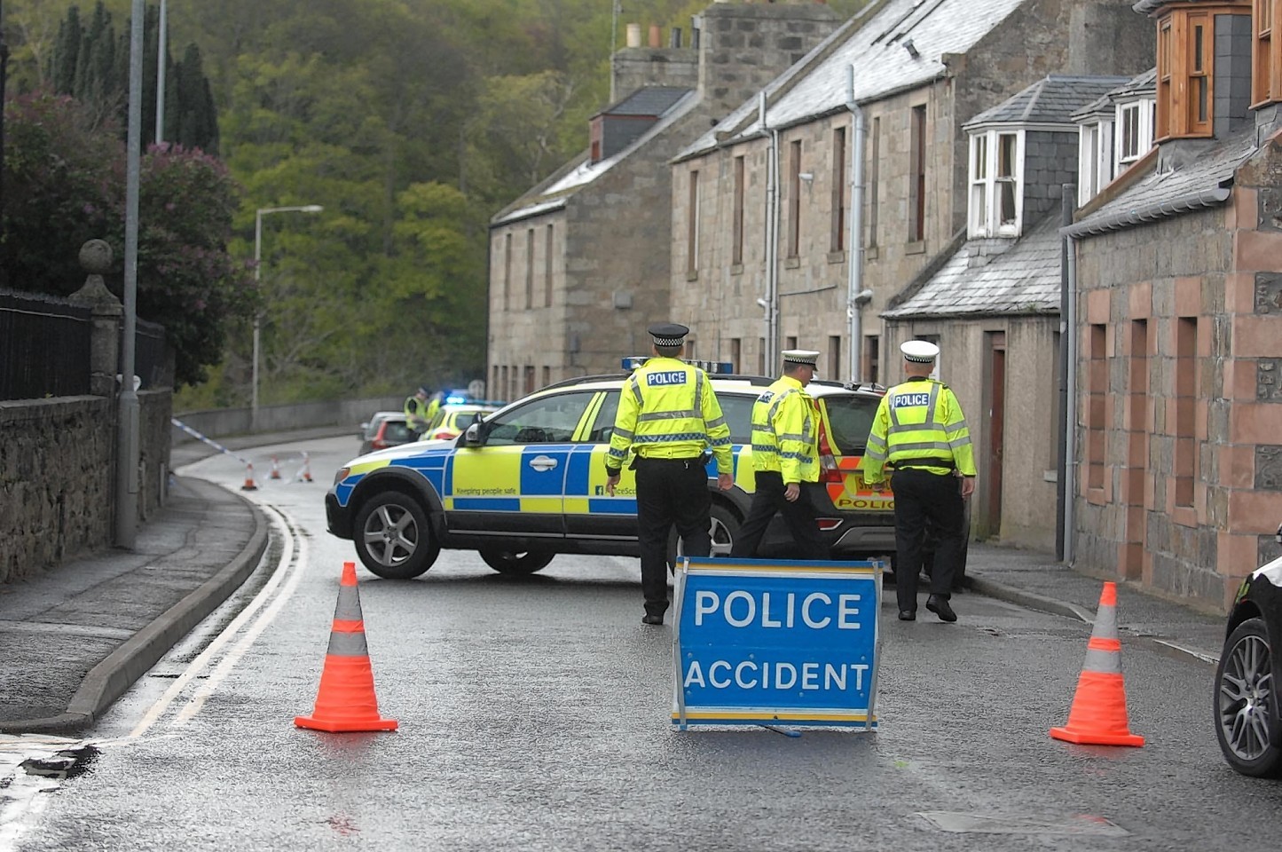 Police at the scene of the crash on Bogie Street, Huntly