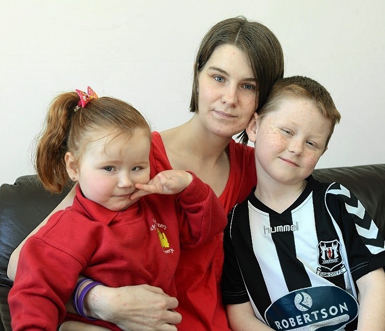 Isla Evans, of Elgin, with her children