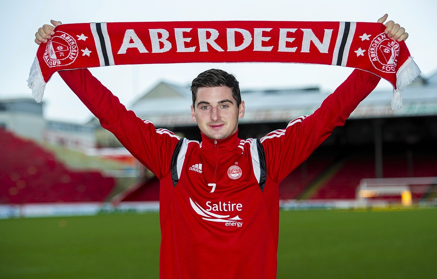 Kenny McLean was officially unveiled as a Dons player yesterday