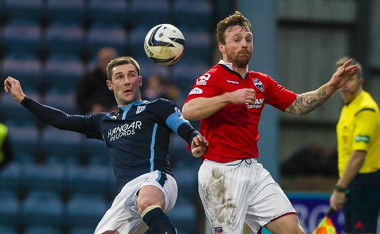 Kevin Thomson and Craig Curran challenge for the ball when the teams met earlier this season