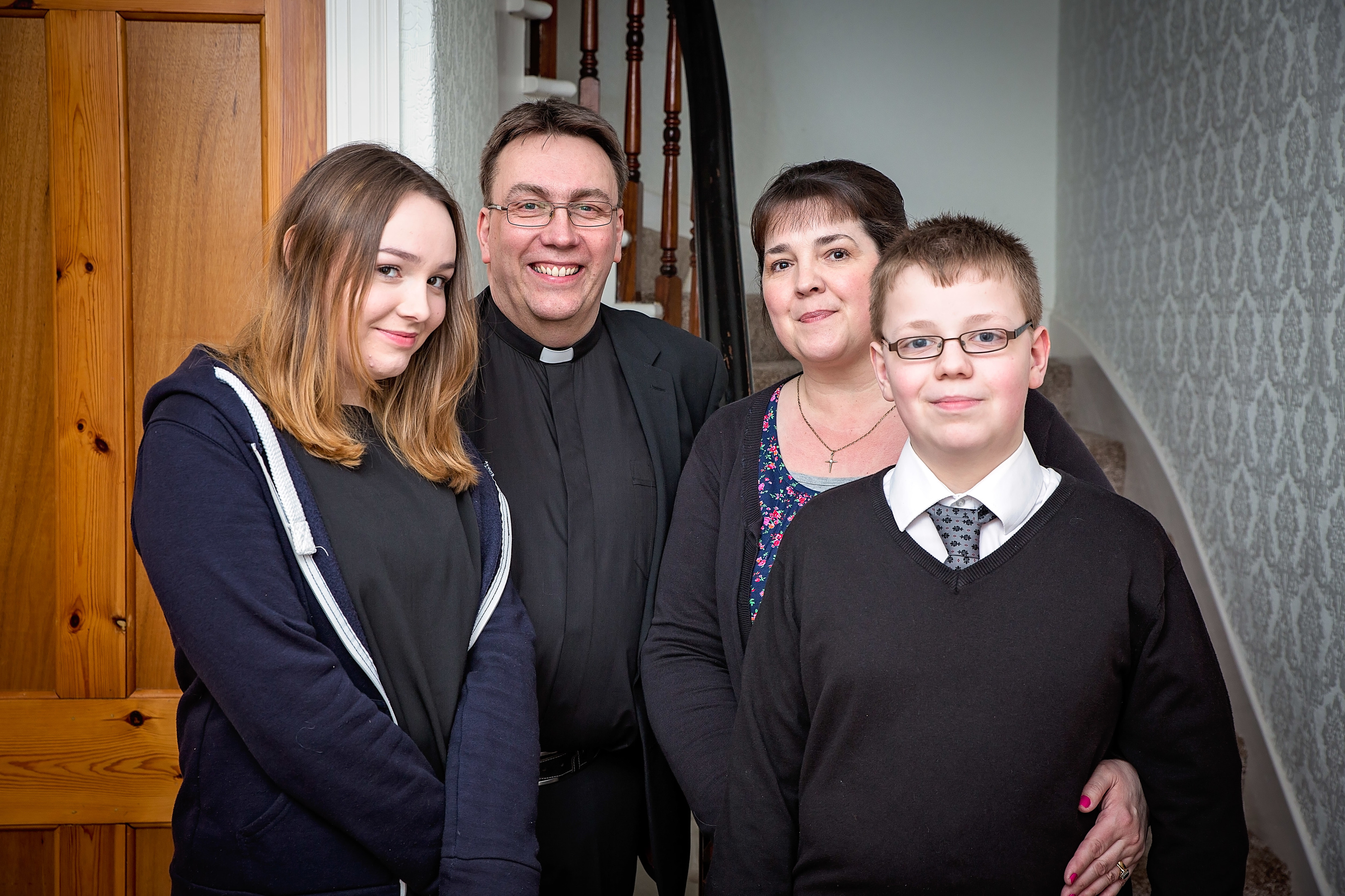The Rev Wayne Pearce, his wife Margaret and children Bethany and Mark.