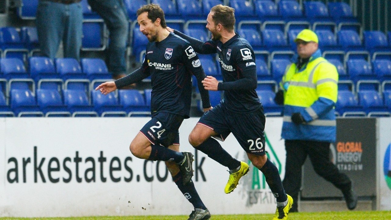 Raffaele De Vita, left, celebrates a goal with Ross County team-mate Martin Woods. 