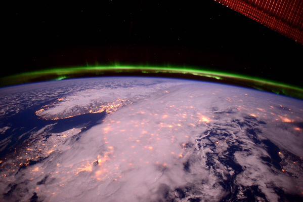 The aurora shielding the earth, as pictured from the ISS
