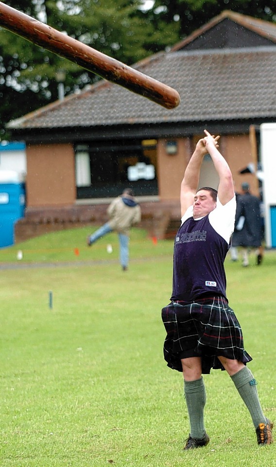 A strong man parties with his man skirt on