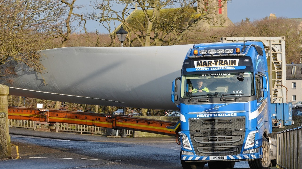 The turbine being transported through Wick town centre
