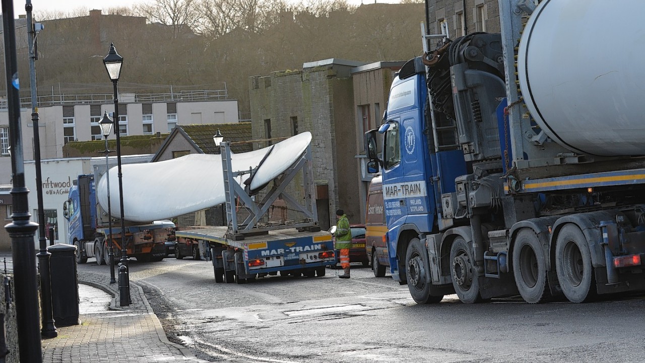 The turbine being transported through Wick town centre