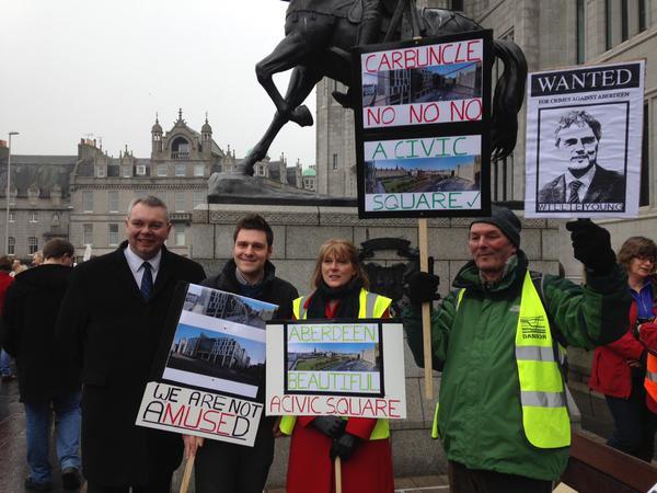 Councillor Ross Thomson with demonstrators