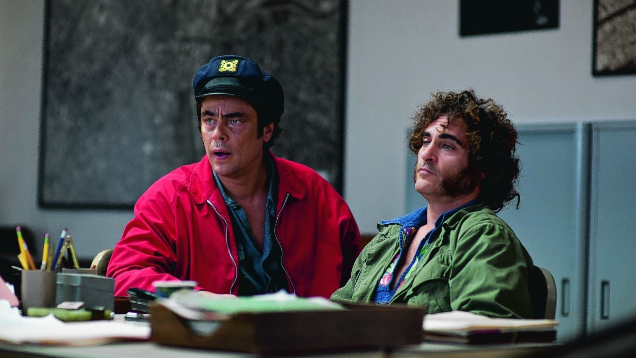 Benicio del Toro as Sauncho Smilax and Joaquin Phoenix as Doc Sportello