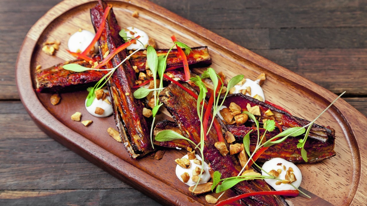 HARISSA-GLAZED AUBERGINE, COCONUT, PEANUT AND CORIANDER