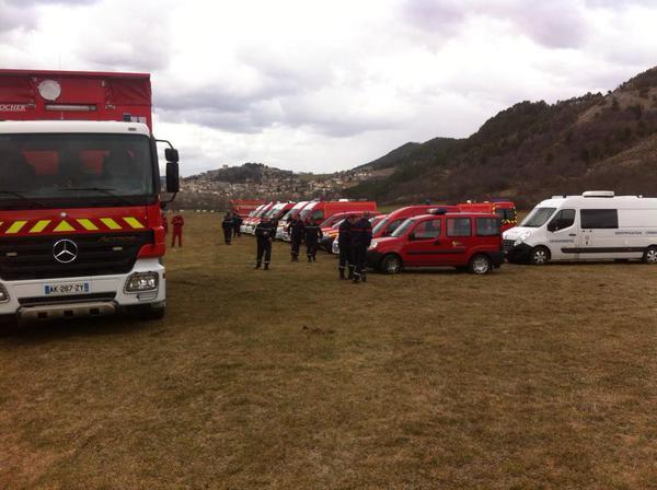 Rescue teams gather near Barcelonnette preparing to leave for the crash site